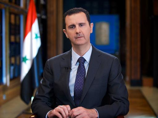 A handout picture released by the official Syrian Arab News Agency (SANA) on September 25, 2013 shows President Bashar al-Assad giving an interview with Venezuelan television station TeleSUR in Damascus