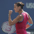 Flavia Pennetta of Italy reacts during her match with Maria Sharapova of Russia during the U.S. Open tennis tournament in New York, Friday, Sept. 2, 2011. (AP Photo/Charlie Riedel)