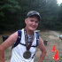 In this photo taken Aug. 27, 2011, Brandon Mulnix is shown after the North Country Run in Manistee, Mich. Mulnix, of Lowell, says he consumed only liquid nutrition while running for more than 12 hours in the 50 mile race. Doctors had wired Mulnix's jaw 10 days before the North Country Trail Run. (AP Photo/Emily Mulnix)
