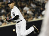 New York Yankees shortstop Derek Jeter drops the ball for an error during the fourth inning of a baseball game against the Tampa Bay Rays Thursday, Sept. 22, 2011, at Yankee Stadium in New York. (AP Photo/Frank Franklin II)