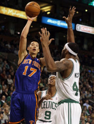 BOSTON, MA - MARCH 04: Jeremy Lin #17 of the New York Knicks takes a shot as Chris Wilcox #44 of the Boston Celtics defends on March 4, 2012 at TD Garden in Boston, Massachusetts. The Boston Celtics defeated the New York Knicks 115-111 in overtime. NOTE TO USER: User expressly acknowledges and agrees that, by downloading and or using this photograph, User is consenting to the terms and conditions of the Getty Images License Agreement. (Photo by Elsa/Getty Images)