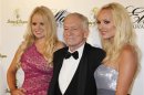 Playboy magazine founder Hugh Hefner and girlfriends Anna Sophia Berglund and Shera Bechard arrive at the Society of Singers annual dinner in Beverly Hills