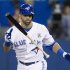 Toronto Blue Jays' Jose Bautista tosses his bat after a called strike in the fifth inning of their MLB American League baseball game against the Cleveland Indians in Toronto