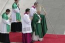 Pope Benedict XVI celebrates a mass marking the opening of the Synod of bishops in St. Peter's square at the Vatican