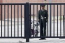 A paramilitary police officer stands guard outside the U.S. embassy in Beijing