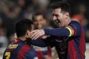 Barcelona's Lionel Messi celebrates with teammates scoring his side's 4th goal during a Champions League Group F soccer match between APOEL and FC Barcelona at GSP stadium, in Nicosia, Cyprus, Tuesday, Nov. 25, 2014. (AP Photo/Petros Karadjias)