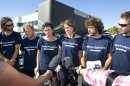 In this photo provided by Greenpeace, actress Lucy Lawless, fourth from left, and five Greenpeace activists, from left, Mike Buchanan, Raoni Hammer, Vivienne Hadlow, Shai Nades and Shayne Comino, speak to the media outside the central police station in New Plymouth, New Zealand, Monday, Feb. 27, 2012, after their release on bail on charges relating to protesting aboard Arctic oil-drilling ship, the Noble Discoverer, in Port Taranaki. Police on Monday arrested actress Lawless and the five Greenpeace environmental activists after the group spent four days protesting aboard the oil-drilling ship docked in New Zealand. (AP Photo/Greenpeace, Nigel Marple) NO SALES, NO ARCHIVES, EDITORIAL USE ONLY, MANDATORY CREDIT