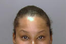 FILE - This undated file photo provided by the Philadelphia Police Department shows Padge Gordon, also known as Padge Victoria Windslowe. An aspiring rapper known as "the Black Madam," Windslowe is accused of killing a 20-year-old dancer from London during a procedure that involved silicone buttocks injections and Krazy Glue. Her third-degree murder trial is expected to start Thursday, Feb. 19, 2015 in Philadelphia Common Pleas Court. (AP Photo/Philadelphia Police Department, File)