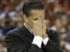 Kentucky head coach John Calipari reacts during the first half of an NCAA Final Four semifinal college basketball tournament game against Louisville Saturday, March 31, 2012, in New Orleans. (AP Photo/David J. Phillip)