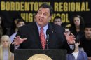 New Jersey Gov. Chris Christie answers a question in Bordentown, N.J., Monday, March 12, 2012, about what caused him to recently call a vocal opponent to the proposed Rutgers Camden-Rowan merger an 