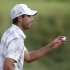 South Africa's Charl Schwartzel reacts after putting on the 17th green during the third round of the 2013 U.S. Open golf championship at the Merion Golf Club in Ardmore
