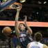 Charlotte Bobcats' Byron Mullens (22) dunks the ball as he gets between Orlando Magic's Glen Davis (11) and Ryan Anderson (33) during the first half of an NBA basketball game, Wednesday, April 25, 2012, in Orlando, Fla. (AP Photo/John Raoux)