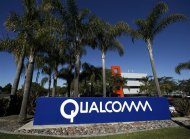 A Qualcomm sign is seen at one of Qualcomm's numerous buildings located on its San Diego Campus February 7, 2011.   REUTERS/Mike Blake