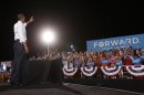 U.S. President Obama waves to supporters during a campaign rally at Desert Pines High School in Las Vegas