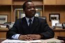 Zimbabwean economist John Mangudya who was appointed central bank governor poses in his office on March 24, 2014 in Harare