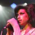 FILE - In this Oct. 25, 2007 file photo, British singer Amy Winehouse performs during her concert at the Volkshaus in Zurich, Switzerland. Winehouse was found dead Saturday, July 23, 2011, by ambulance crews who were called to her home in north London's Camden area. She was 27. (AP Photo/Keystone, Steffen Schmidt, File)