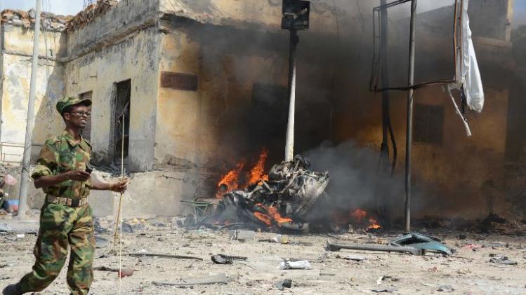 A file picture taken on May 5, 2013 shows a Somali soldier cordoning off the area following a suicide attack on a government convoy in Mogadishu
