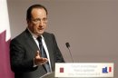 French President Francois Hollande speaks during the opening of the Qatari-French Business Forum in Doha