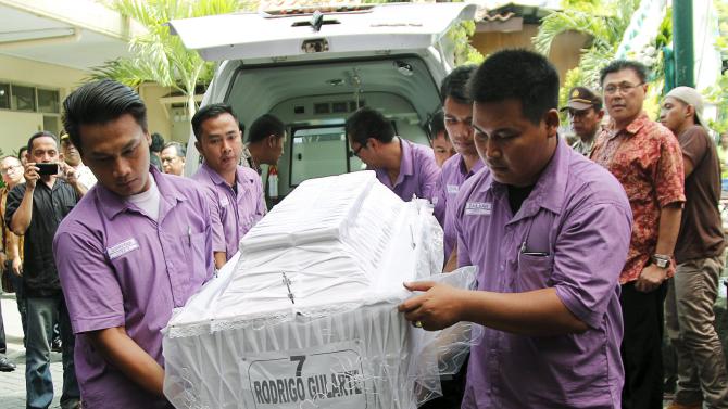The body of Brazilian Rodrigo Gularte who was executed earlier arrives at a funeral home in Jakarta, Indonesia