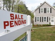 In this May 12, 2011 photo, a real estate sign announces a pending residential home sale in Wayland, Mass. Pending home sales fell in April with regional variations following increases in February and March, with unusual weather and economic softness adding to ongoing problems that are hobbling a recovery, according to the National Association of Realtors(R). (AP Photo/Bill Sikes)