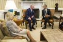 U.S. President Barack Obama (R) meets with Britain's Prince Charles, Prince of Wales, and his wife Camilla, the Duchess of Cornwall, in the Oval Office of the White House in Washington