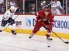 Mikkel Boedker of the Phoenix Coyotes skates past Mike Fisher of the Nashville Predators during the May 7 game