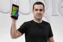 Hugo Barra, director of Product Management at Android, holds the new Nexus 7 tablet during a Google event at Dogpatch Studio in San Francisco