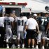 Philadelphia Eagles players and coaches including head coach Andy Reid, center in white hat, gather around defensive tackle Mike Patterson as he is put into an ambulance after he had a seizure during an NFL football training camp practice at Lehigh University Wednesday, Aug. 3, 2011 in Bethlehem, Pa. (AP Photo/Alex Brandon)