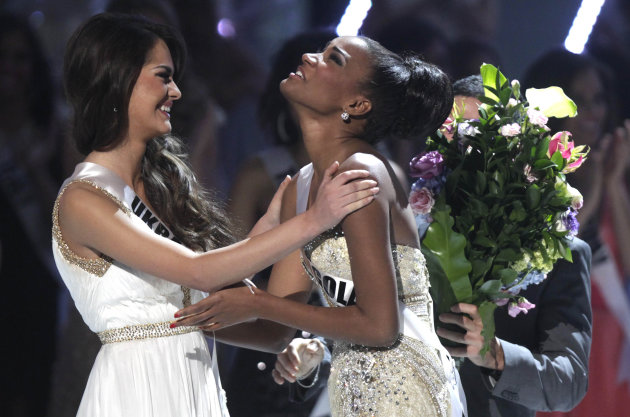 Miss Angola Leila Lopes, right, and Miss Ukraine Olesia Stefanko react after Lopes was named Miss Universe 2011 and Stefanko first runner up at the Miss Universe pageant in Sao Paulo, Brazil, Monday S