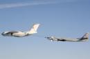 Handout photo of a Russian Tupolev Tu-95 strategic bomber refuelling over an unknown location during a military exercise