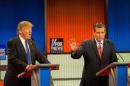 Republican Presidential candidates Ted Cruz (R) and Donald Trump spar during the Republican Presidential Debate in Detroit, Michigan, March 3, 2016