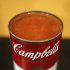 This Aug. 31, 2011 photo shows an opened can of Campbell's soup in New York. Campbell Soup Co.'s fiscal fourth-quarter net income slipped 12 percent Friday, Sept. 2, 2011, weighed down by restructuring charges. But the food maker's adjusted results surpassed Wall Street's expectations, and its revenue rose on strong results from its baking and snacking segment. (AP Photo/James H. Collins)