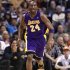 Los Angeles Lakers' Kobe Bryant brings the ball up during the first half of an NBA basketball game against the Phoenix Suns, Sunday, Feb. 19, 2012, in Phoenix. (AP Photo/Matt York)