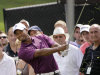 Tiger Woods hit from the rough to the ninth green during first round play in the Bridgestone Invitational golf tournament at Firestone Country Club in Akron, Ohio on Thursday, Aug. 4, 2011. (AP Photo/Amy Sancetta)
