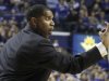 Morehead State coach Sean Woods, a former Kentucky player, gestures to one of his players during the first half of an NCAA college basketball game against Kentucky in Lexington, Ky., Wednesday, Nov. 21, 2012. Kentucky won 81-70. (AP Photo/James Crisp)