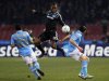 Napoli's Walter Gargano and Salvatore Aronica challenge Chelsea's Didier Drogba during their Champions League last 16 first leg soccer match at the San Paolo stadium in Naples