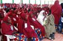 Brides attend a wedding feast at the Kano state governor's office