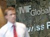A man exits the office complex where MF Global Holdings Ltd have an office on 52nd Street in midtown Manhattan New York