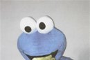 A handout picture from Hannoverische Allgemeine Zeitung newspaper shows an extortionist dressed as the 'Cookie Monster'