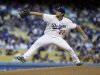 Los Angeles Dodgers starter Clayton Kershaw pitches to the Washington Nationals in the first inning of a baseball game in Los Angeles Tuesday, May 14, 2013. (AP Photo/Reed Saxon)