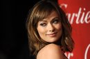 FILE - In this Jan. 7, 2012 file photo, actress Olivia Wilde poses at the 2012 Palm Springs International Film Festival Awards Gala in Palm Springs, Calif. Wilde will host the EIF Revlon Run/Walk in New York on May 5. (AP Photo/Chris Pizzello, file)