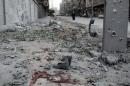 Restos de sangre entre las ruinas en Alepo, norte de Siria, el 6 de noviembre de 2013