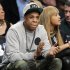 FILE - In this Nov. 26, 2012, file photo, rap mogul and Brooklyn Nets minority owner Jay-Z and his wife, Beyonce, watch an NBA basketball game between the Nets and the New York Knicks at Barclays Center in New York. Jay -Z is selling his stake in the Nets so he can become certified as a player agent, possibly before the end of the season. The process is underway, with paperwork already filed, a person with knowledge of the details said Wednesday, April 10, 2013. NBA rules prevent anyone from being involved in ownership and player representation. (AP Photo/Kathy Willens, File)