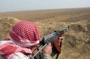 An anti-Qaeda fighter on patrol near the outskirts of Baquba
