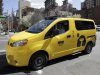 A prototype of the Nissan NV 200 New York City taxi is off-loaded from a truck, in New York, Monday, April 2, 2012. The iconic New York City taxi has gotten a passenger-friendly makeover from Nissan with low-annoyance horns, USB chargers and germ-fighting seats to cut down on bad odors. Medallion owners will be required to buy the Nissan NV 200 at a cost of about $29,000 starting in late 2013. (AP Photo/Richard Drew)