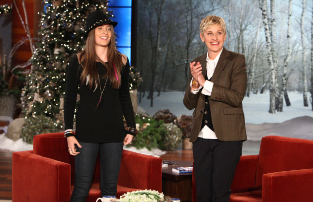 In this Dec. 13, 2011 photo released by Warner Bros., talk show host Ellen DeGeneres, right, welcomes Paris Jackson, daughter of the late pop star Michael Jackson during a taping of "The Ellen DeGeneres Show" in Burbank, Calif. The episode will air on Thursday. (AP Photo/Warner Bros., Michael Rozman)
