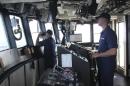 Handout photo of the crew of the U.S. Coast Guard Cutter Vigorous searching for crew members of the sailing vessel Cheeki Rafiki