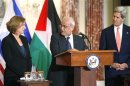 Chief Palestinian negotiator Saeb Erekat directs remarks to Israel's Justice Minister Tzipi Livni during a news conference with U.S. Secretary of State John Kerry in Washington