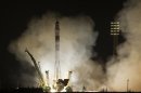 The Soyuz TMA-08M spacecraft carrying the International Space Station (ISS) crew blasts off from the launch pad at the Baikonur cosmodrome