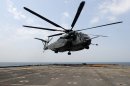 A July 4, 2012 photo provided by the U.S. Navy shows an MH-53E Sea Dragon helicopter preparing to land on the flight deck aboard the Afloat Forward Staging Base (Interim) USS Ponce. The U.S. Navy says Thursday, July 19, 2012, that one of its MH-53E Sea Dragon helicopters has crashed in the Gulf nation of Oman with five crew members aboard. No hostile activity is suspected. Lt. Greg Raelson, a spokesman for the Navy's Bahrain-based 5th Fleet, says an investigation is under way into crash. (AP Photo/U.S. Navy, MC2 Blake Midnight)